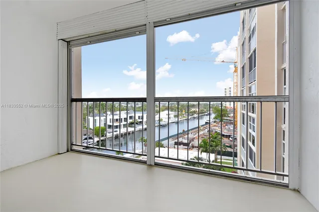 a view of a glass door with a balcony