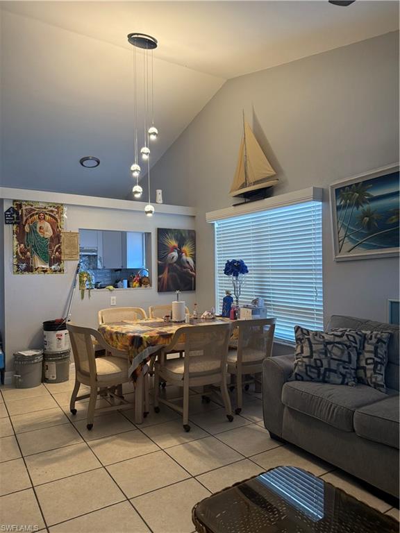 2531 47th Terrace Southwest Naples, FL 34116 - Photo 14 of 17 a living room with lots of furniture and kitchen view