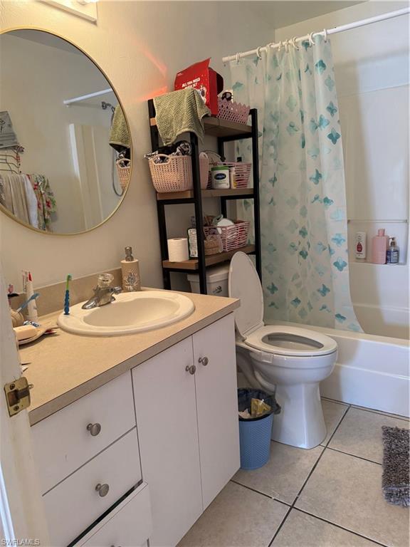 2531 47th Terrace Southwest Naples, FL 34116 - Photo 6 of 17 a bathroom with a toilet sink and mirror