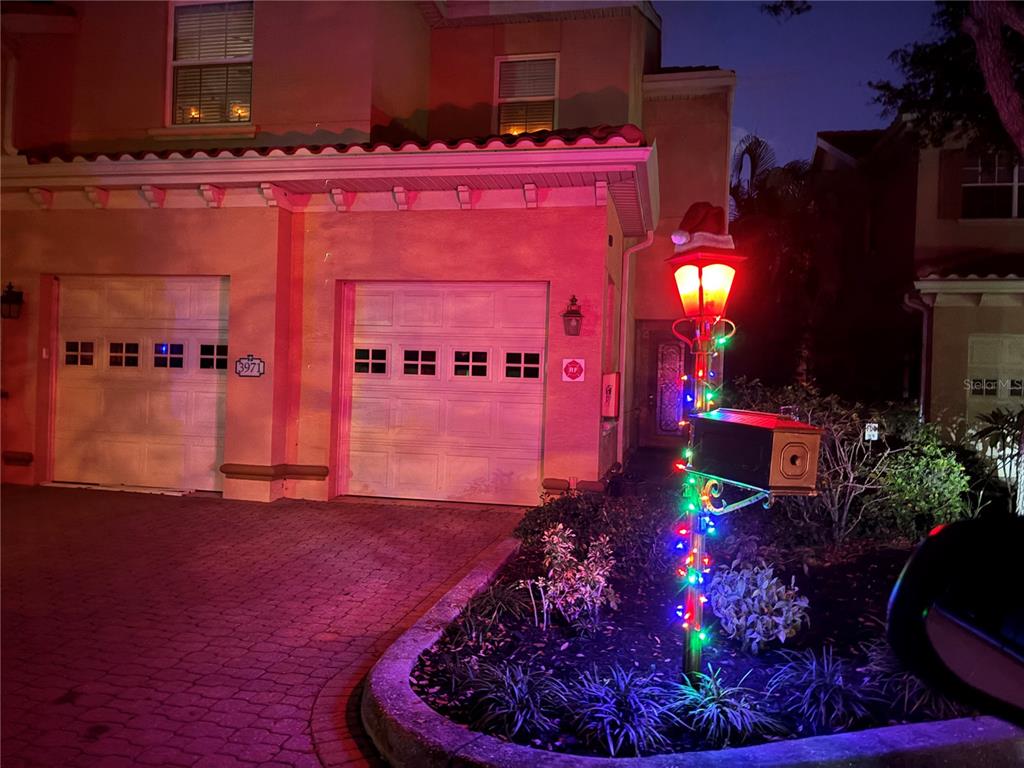 a view of a living room with furniture and a fire place