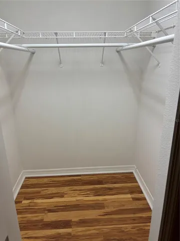 a view of a room with racks on the wall