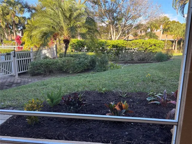 a view of a garden and pathway