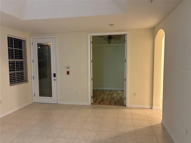 a kitchen with stainless steel appliances granite countertop a sink a stove top oven a counter space and cabinets