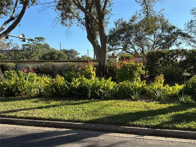 a view of a lake with a garden