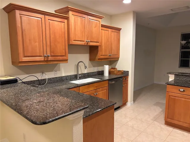 a view of a room with tiles and a window