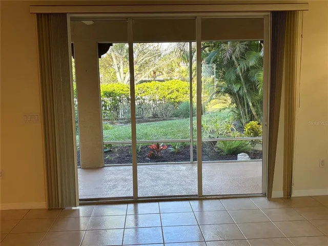 a view of a room that has a window