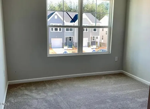 an entryway view with wooden floor