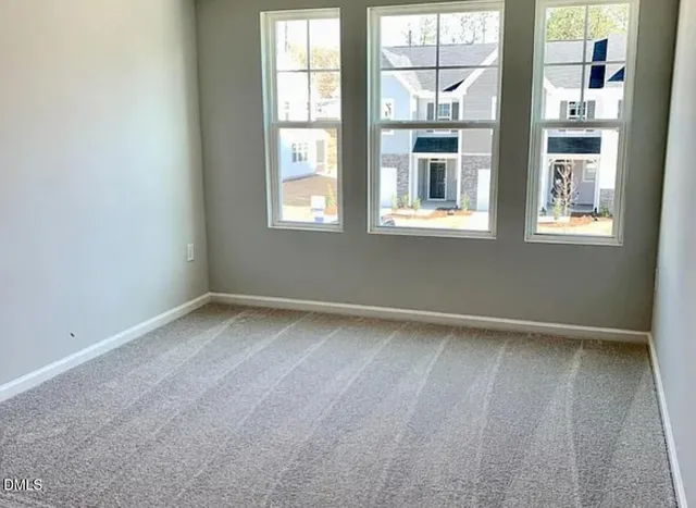 an entryway view with hallway