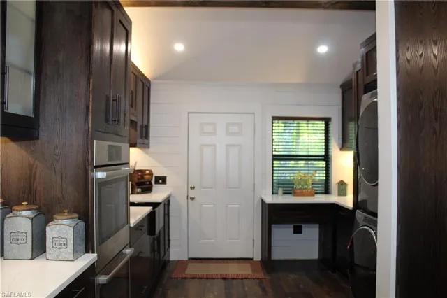 a view of kitchen and windows