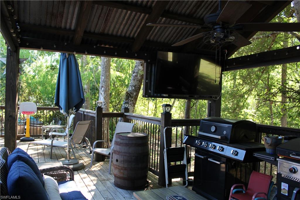 6285 Parkers Hammock Road, Unit B Naples, FL 34112 - Photo 23 of 33 a view of an outdoor sitting area