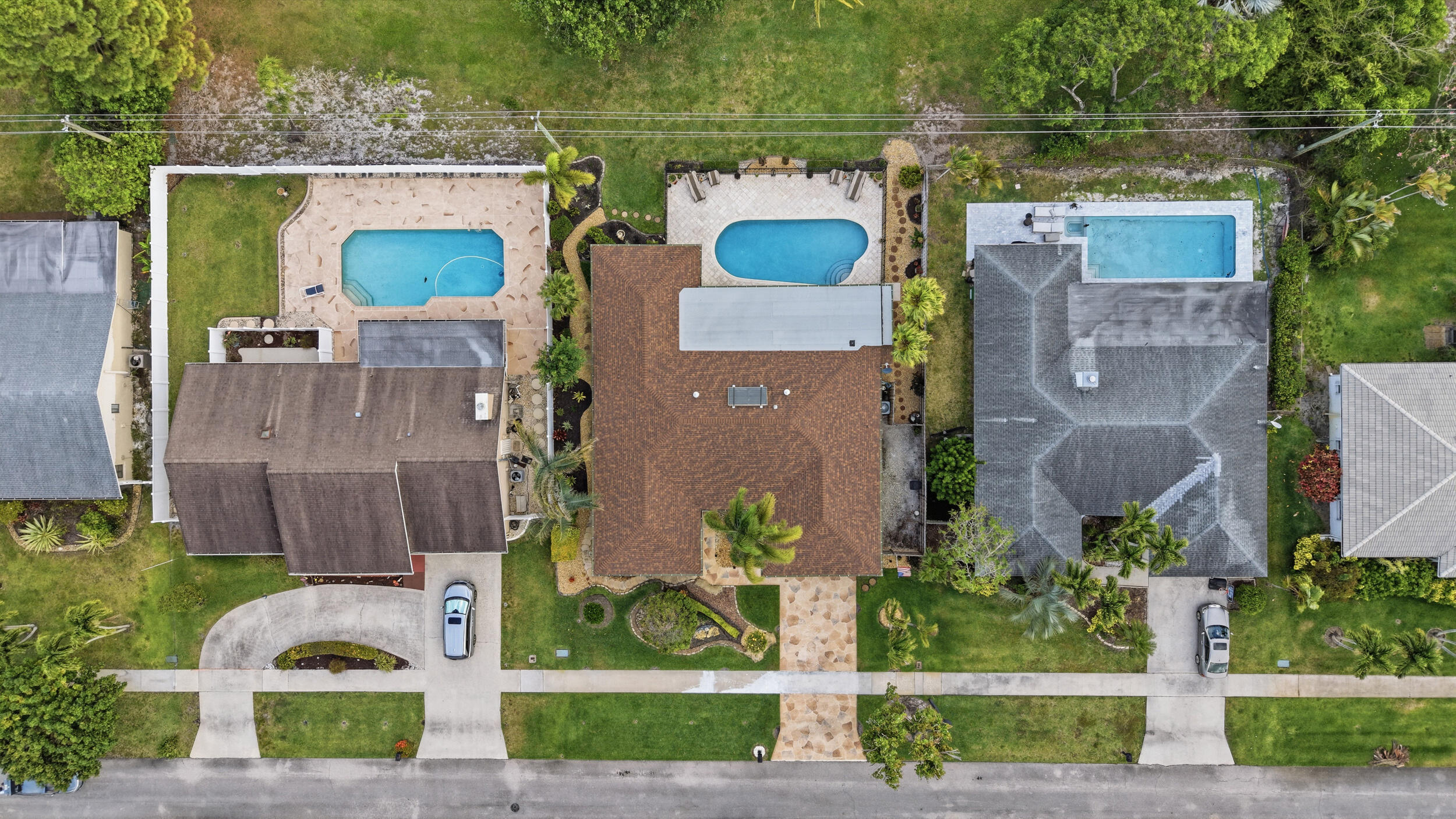 4780 Brandywine Drive Boca Raton, FL 33487 - Photo 37 of 43 a aerial view of a house with a garden and plants