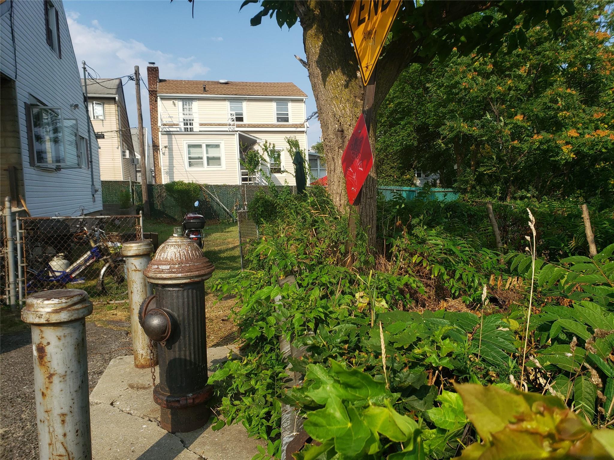 103 Fane Court Brooklyn, NY 11229 - Photo 7 of 11 a view of a house with a sink and garden