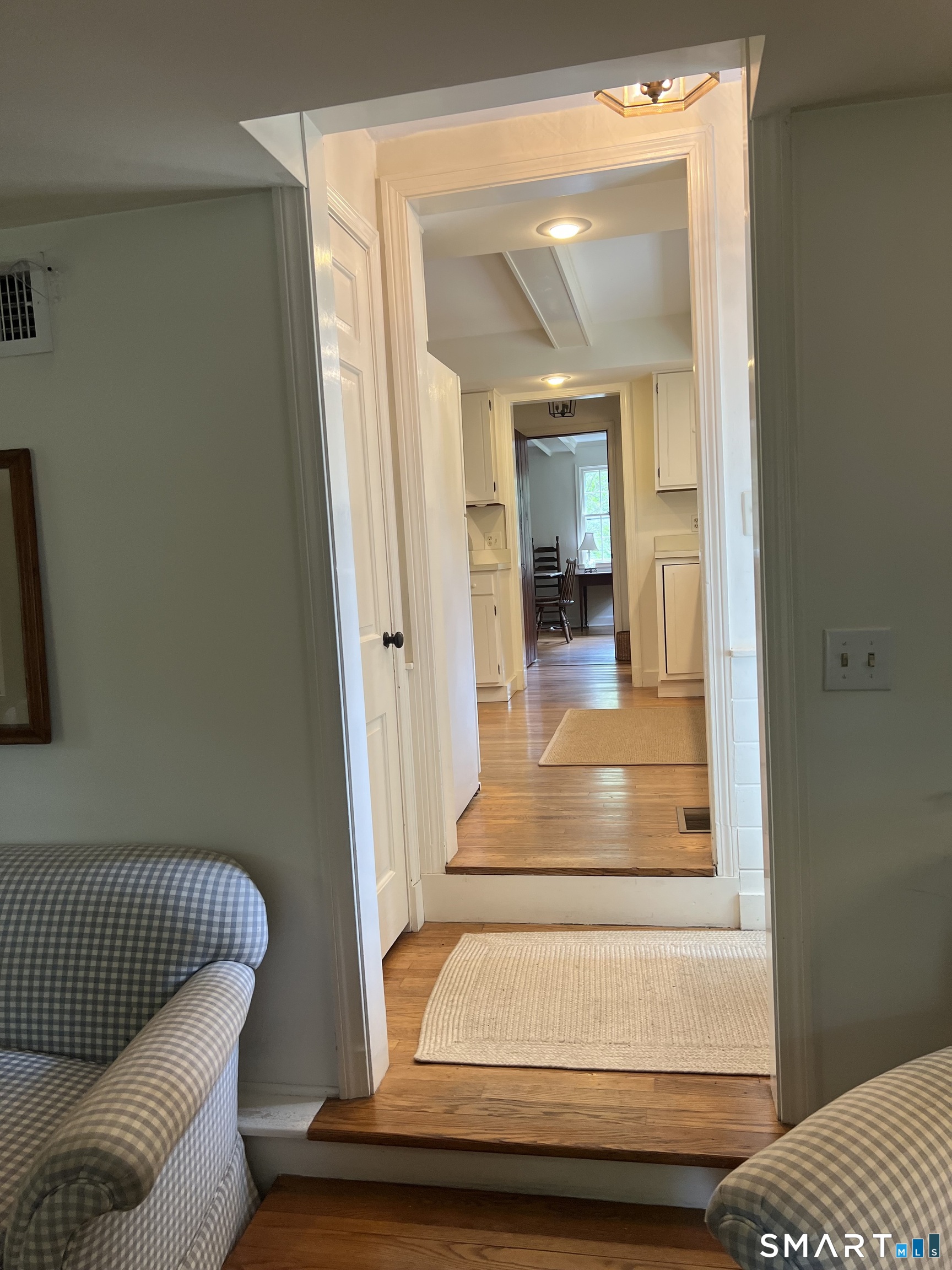 2415 Durham Road Madison, CT 06443 - Photo 19 of 37 Stairs into Kitchen from Living Room