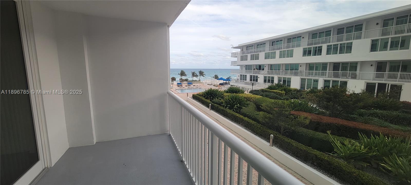 5401 Collins Avenue, Unit 214 Miami Beach, FL 33140 - Photo 21 of 37 a view of balcony with plants