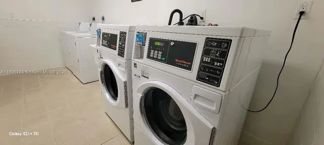 a bed room with a bed and a couch