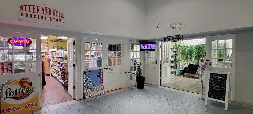 5401 Collins Avenue, Unit 214 Miami Beach, FL 33140 - Photo 26 of 37 Convenience Store and Beauty Salon at Lobby