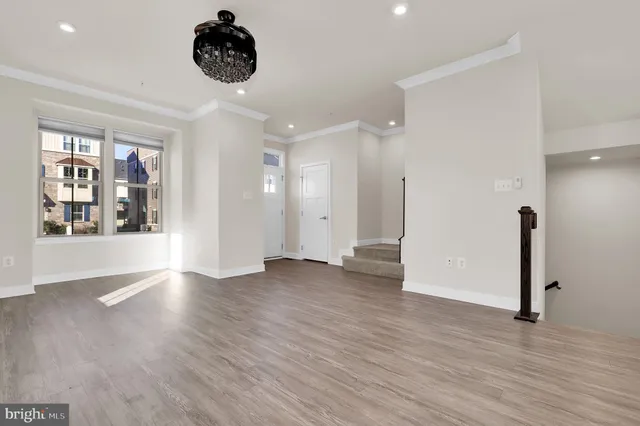 a view of an empty room and window