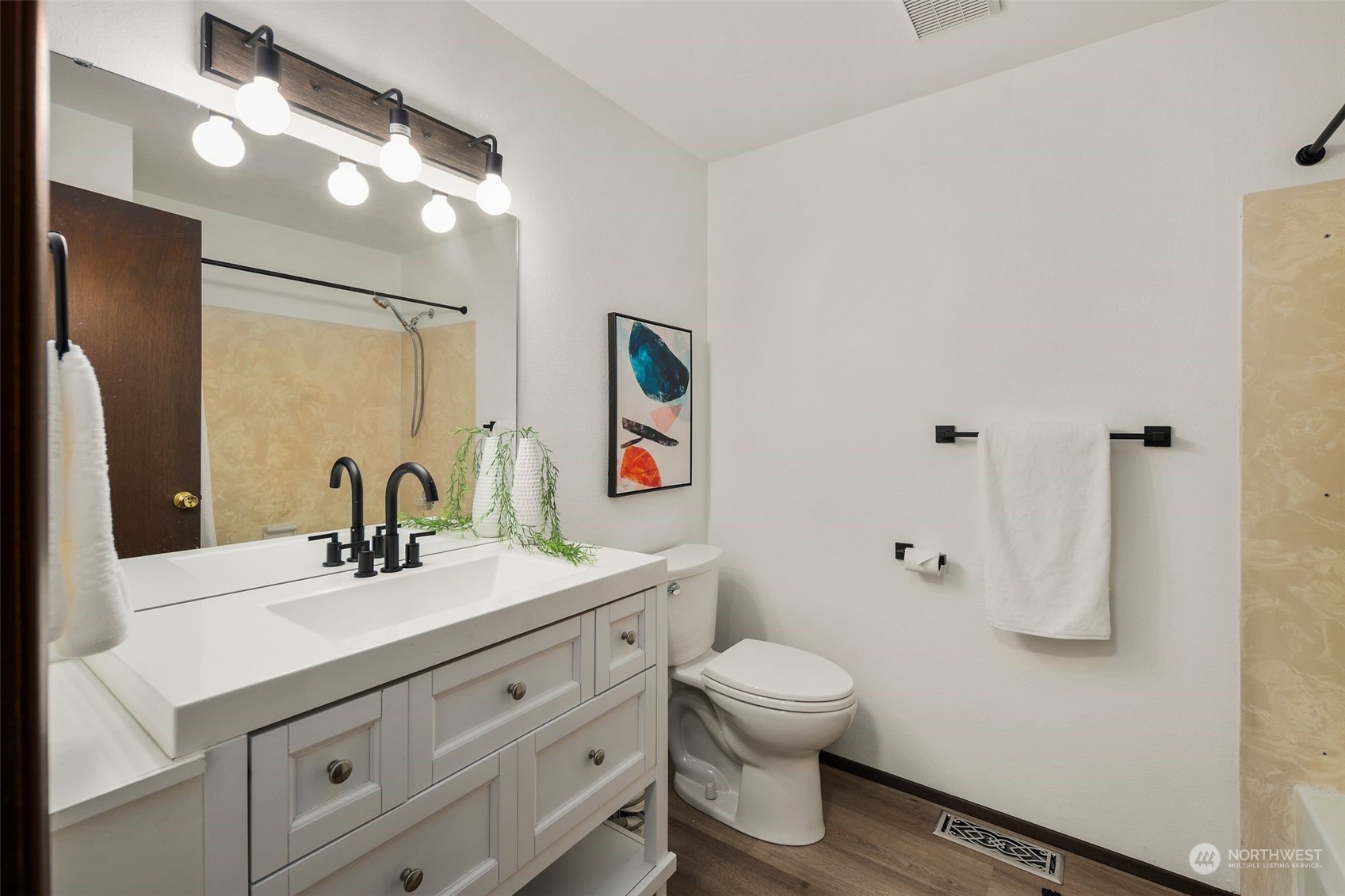 6104 145th Street Southwest Edmonds, WA 98026 - Photo 13 of 29 a bathroom with a sink toilet and shower