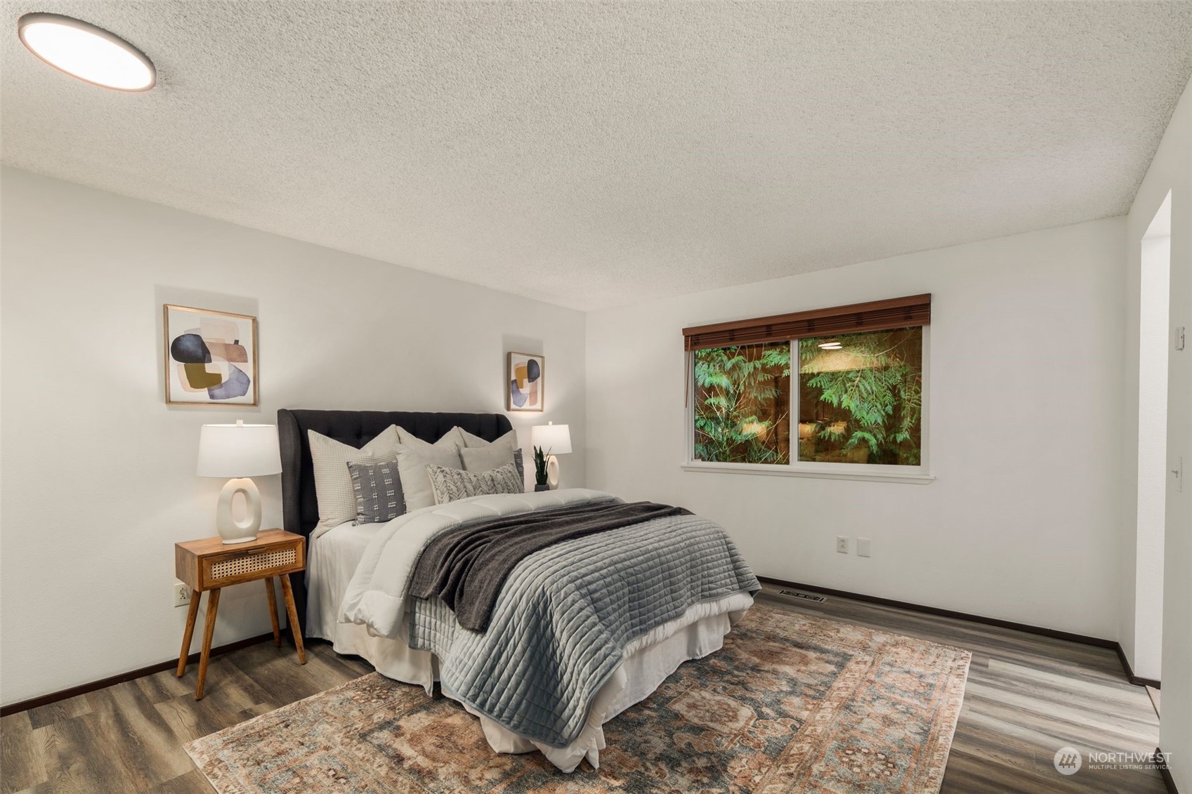 6104 145th Street Southwest Edmonds, WA 98026 - Photo 14 of 29 a bedroom with a bed and a window