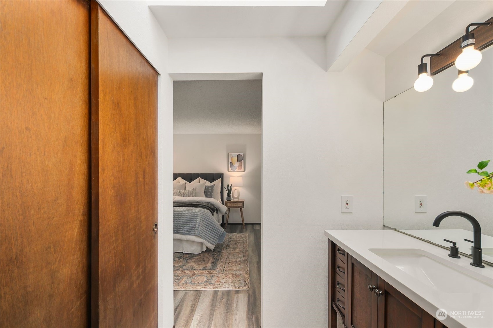 6104 145th Street Southwest Edmonds, WA 98026 - Photo 17 of 29 a en suite bathroom with a sink and a mirror