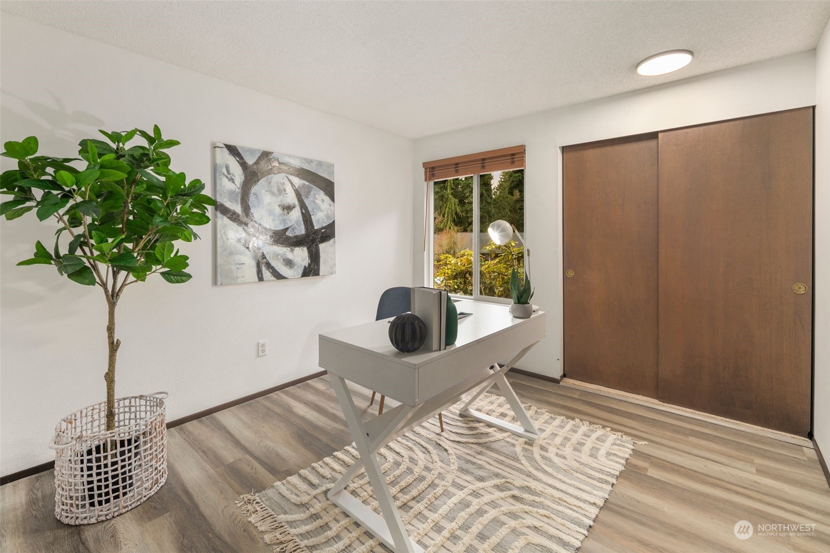 6104 145th Street Southwest Edmonds, WA 98026 - Photo 19 of 29 a bedroom with a bed and a window