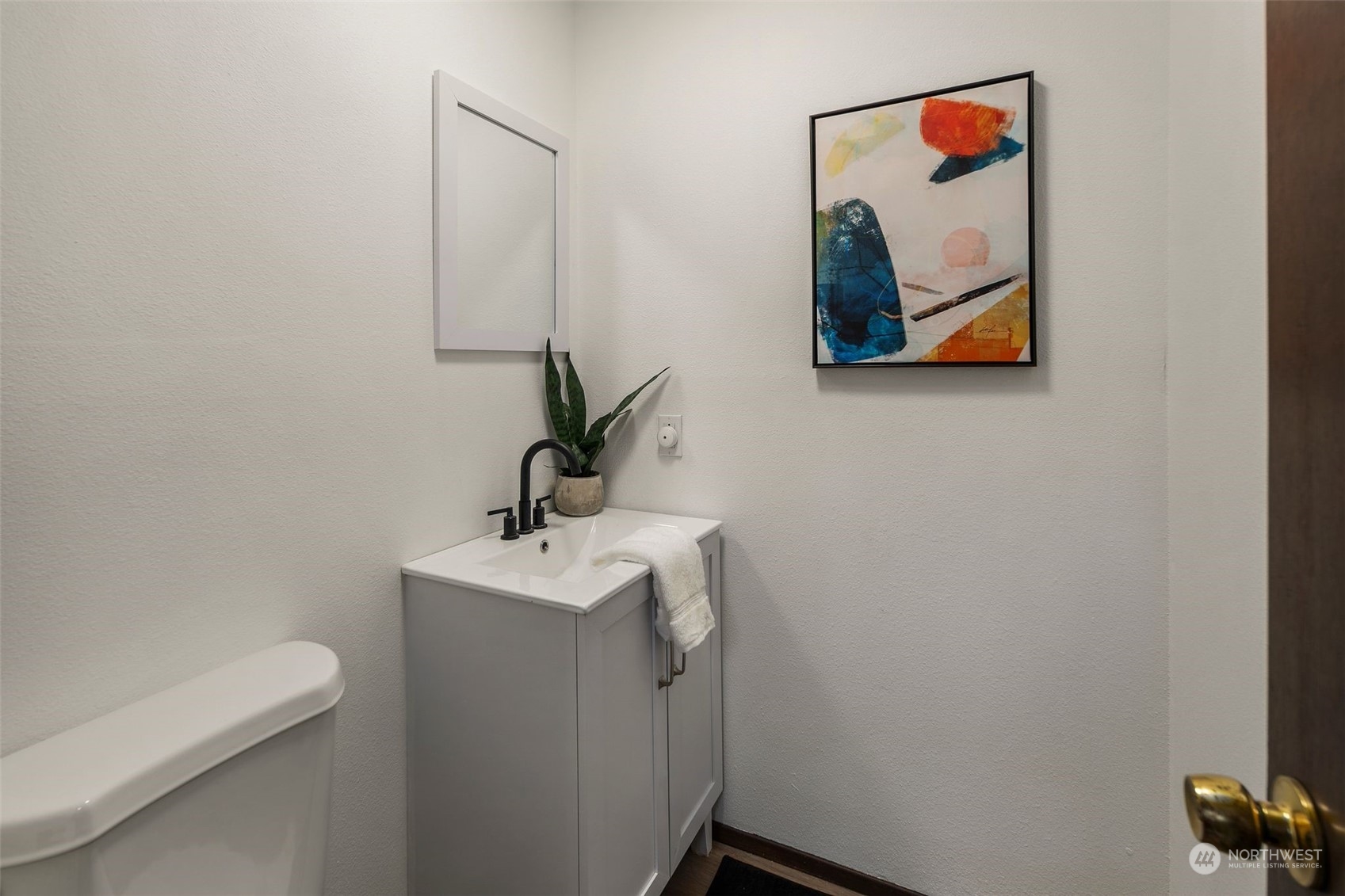 6104 145th Street Southwest Edmonds, WA 98026 - Photo 22 of 29 a bathroom with a toilet and a sink