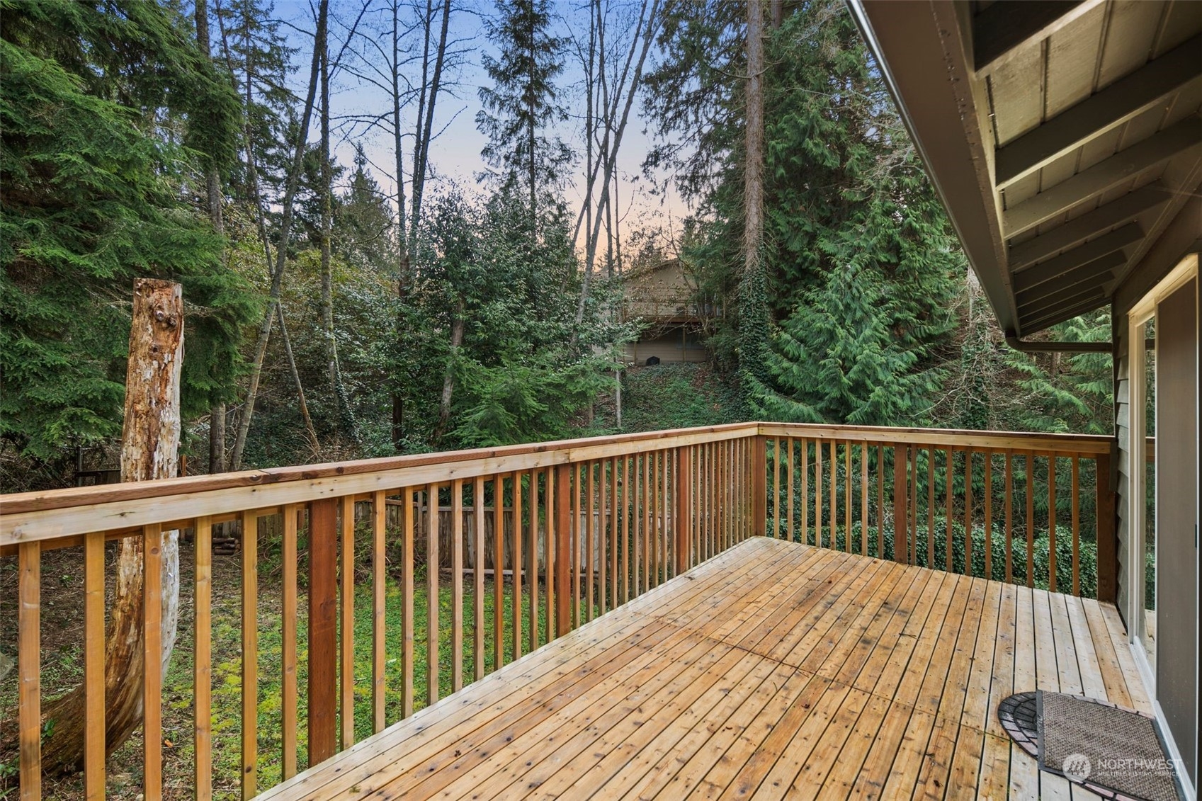 6104 145th Street Southwest Edmonds, WA 98026 - Photo 26 of 29 a balcony with wooden floor and fence