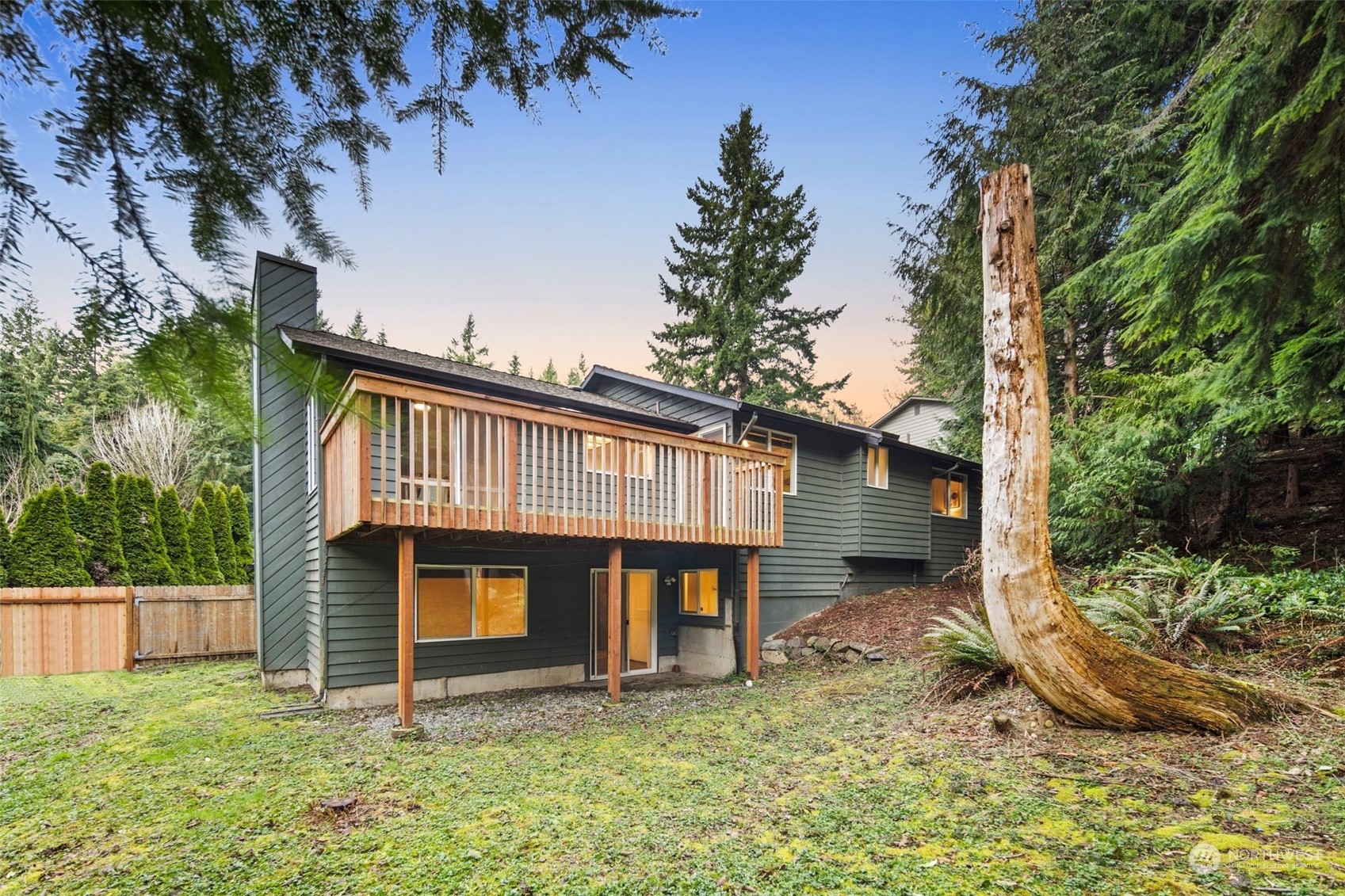 6104 145th Street Southwest Edmonds, WA 98026 - Photo 3 of 29 a front view of a house with a yard