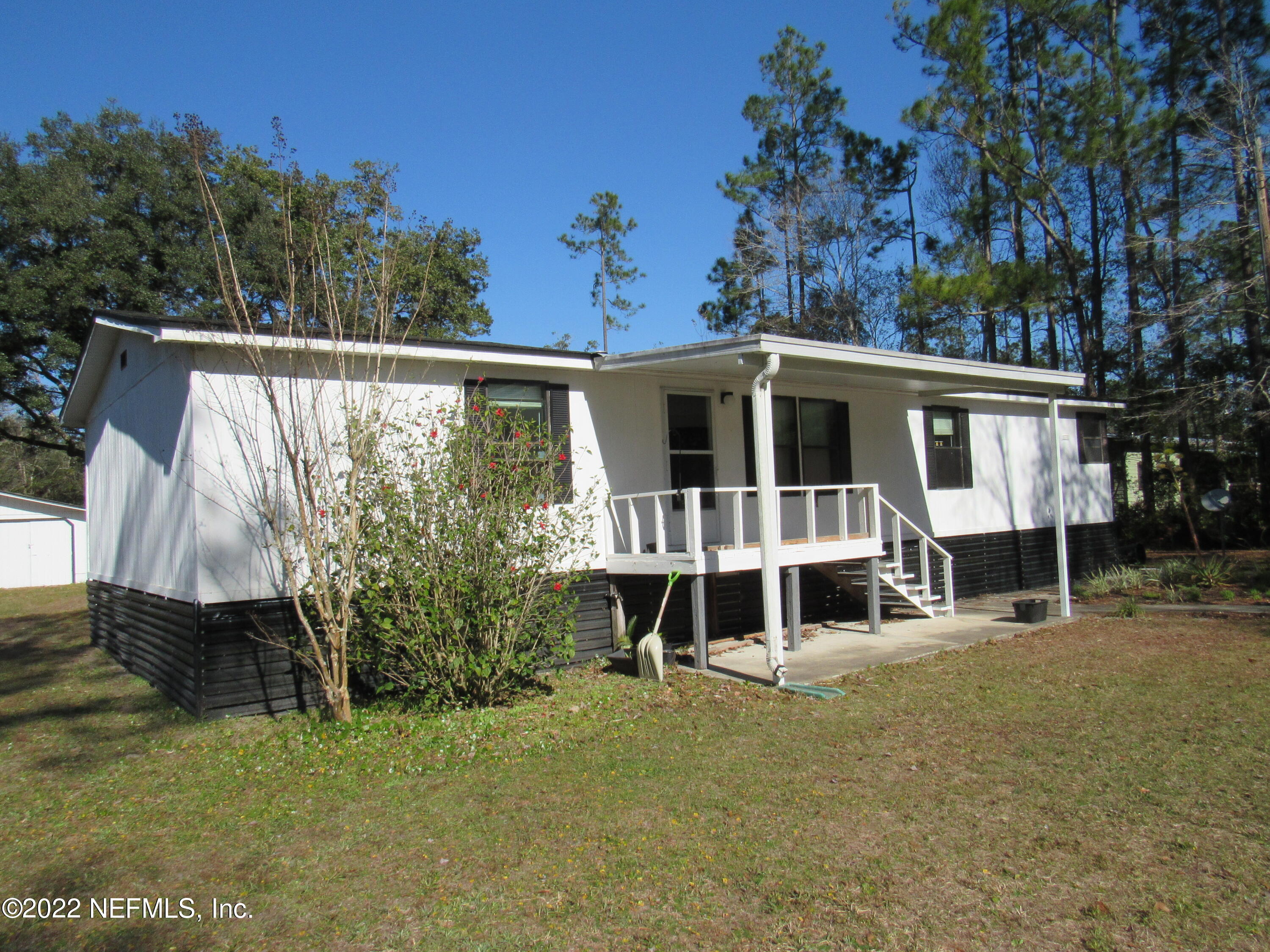 2284 Marlee Road South Jacksonville, FL 32259 - Photo 1 of 19 a house with trees in the background