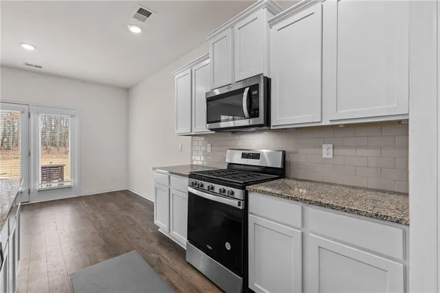 $409,900 | 579 Azalea Bloom Drive East, Loganville, GA 30052