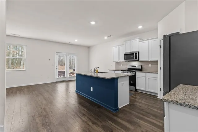 $409,900 | 579 Azalea Bloom Drive East, Loganville, GA 30052