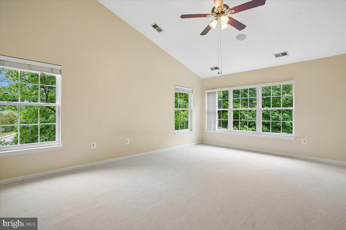 7301 Oldham Leeds Way Springfield, VA 22150 - Photo 14 of 34 a view of an empty room with a window