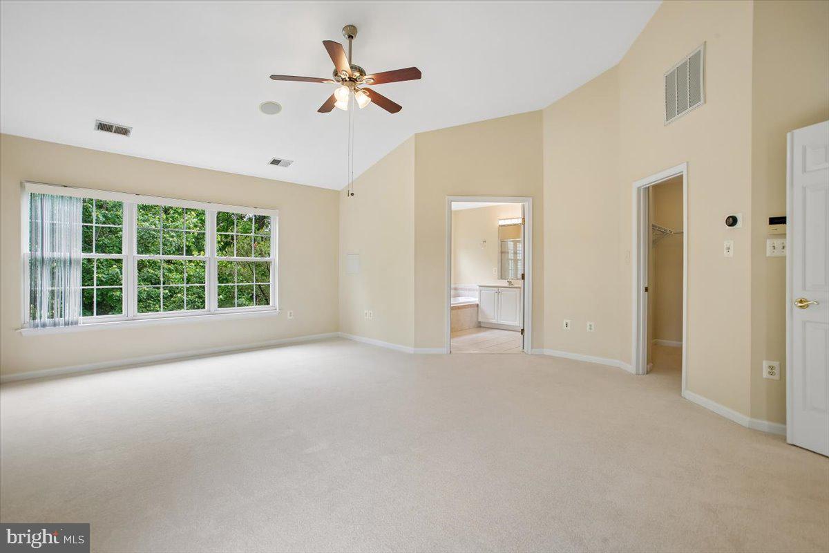 7301 Oldham Leeds Way Springfield, VA 22150 - Photo 15 of 34 a view of an empty room with a window
