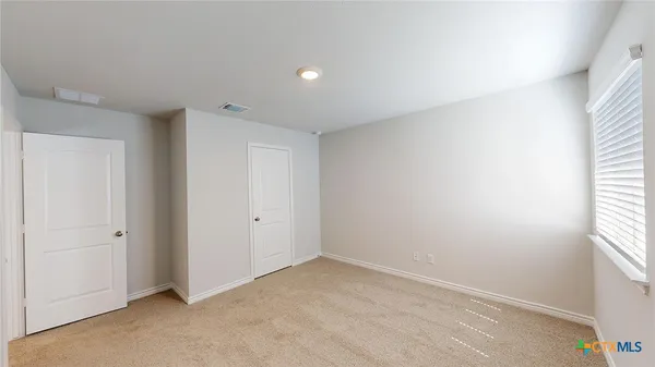an empty room with a door