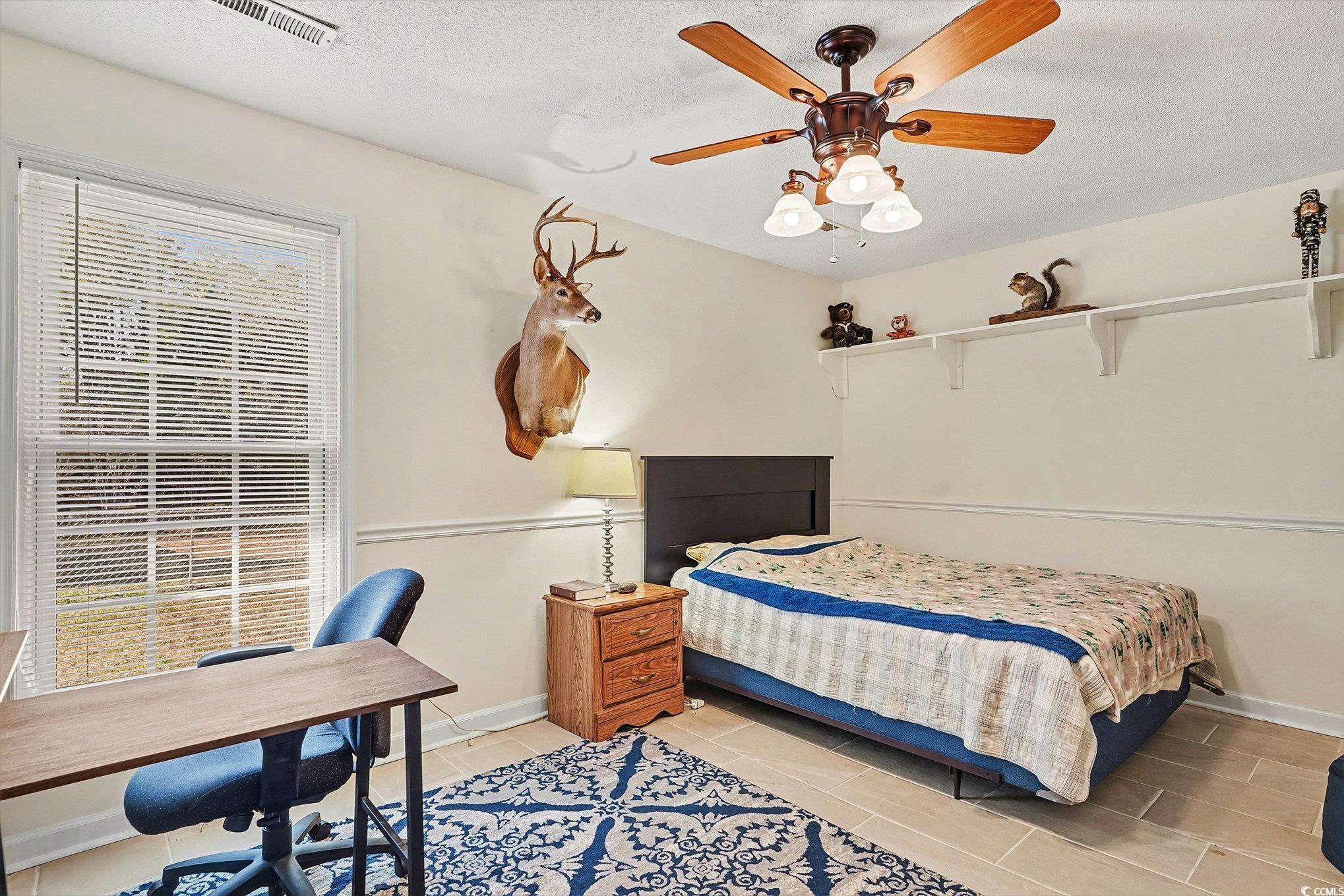 5175 Bottle Branch Road Conway, SC 29527 - Photo 13 of 28 Laundry area featuring lofted ceiling, washing machine and clothes dryer, cabinet space, and a ceiling fan