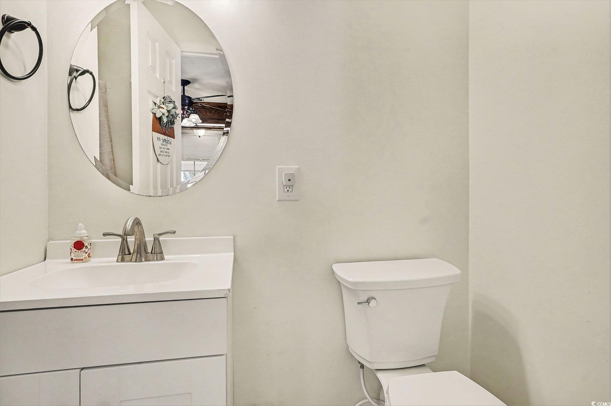 5175 Bottle Branch Road Conway, SC 29527 - Photo 18 of 28 Bedroom featuring a textured ceiling, ceiling fan, and wood finished floors