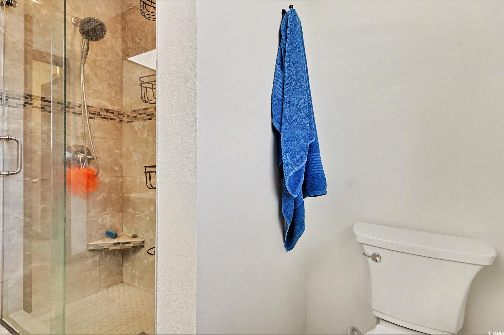 5175 Bottle Branch Road Conway, SC 29527 - Photo 22 of 28 Bedroom featuring a textured ceiling, ceiling fan, and a spacious closet