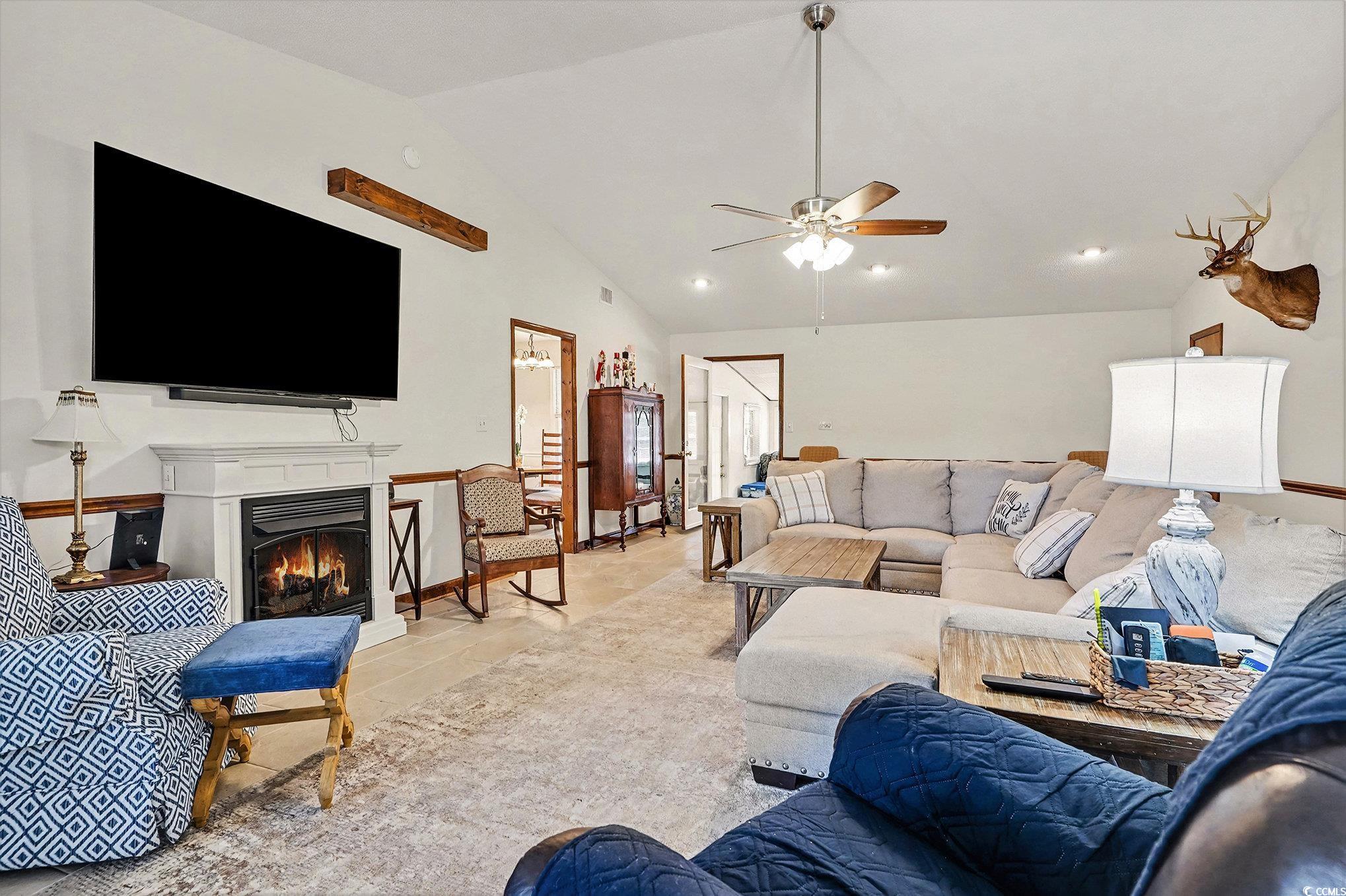 5175 Bottle Branch Road Conway, SC 29527 - Photo 7 of 28 Living area with a ceiling fan and high vaulted ceiling