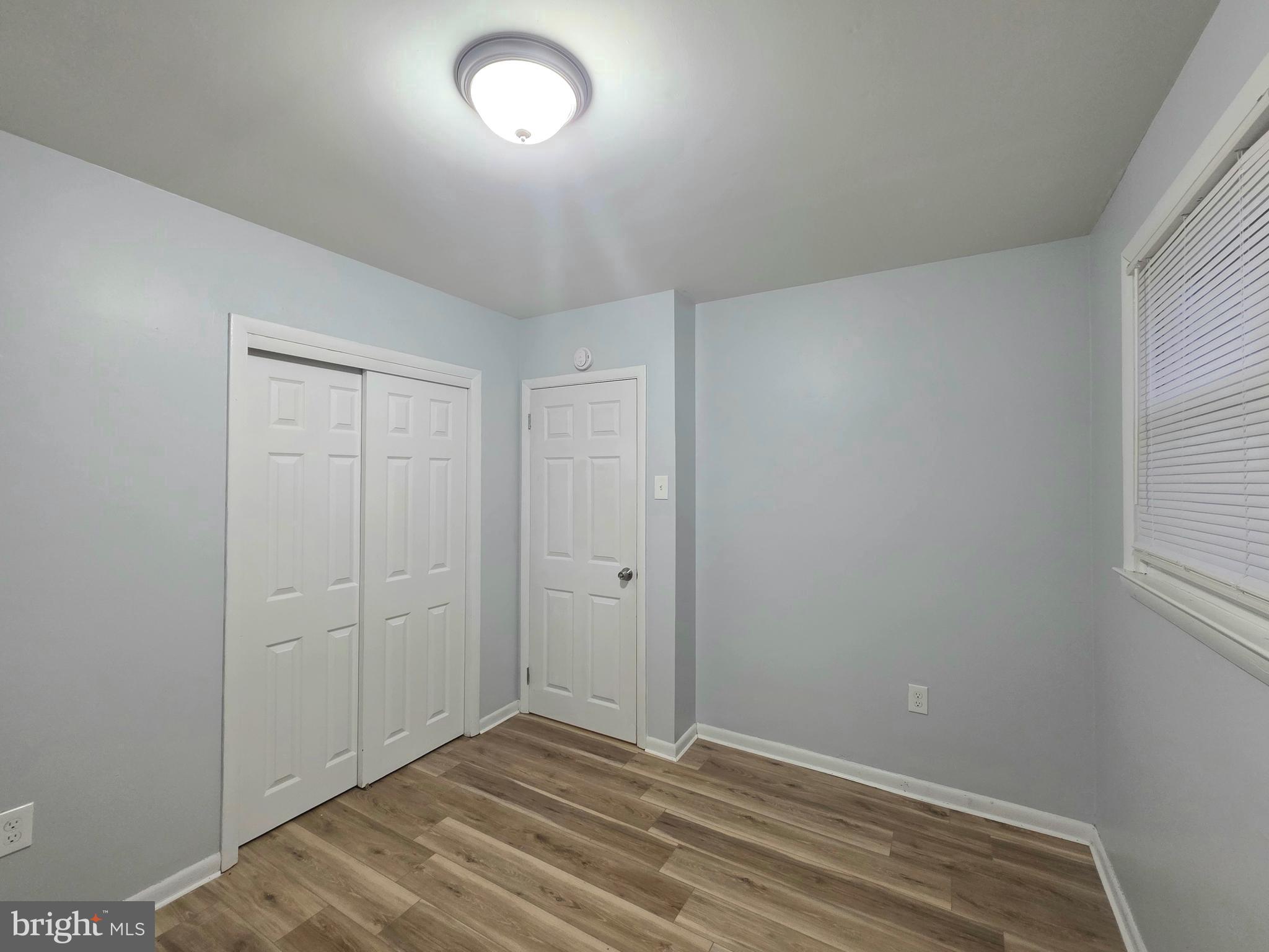 11 Fairview Avenue Bridgeton, NJ 08302 - Photo 27 of 33 wooden floor in an empty room