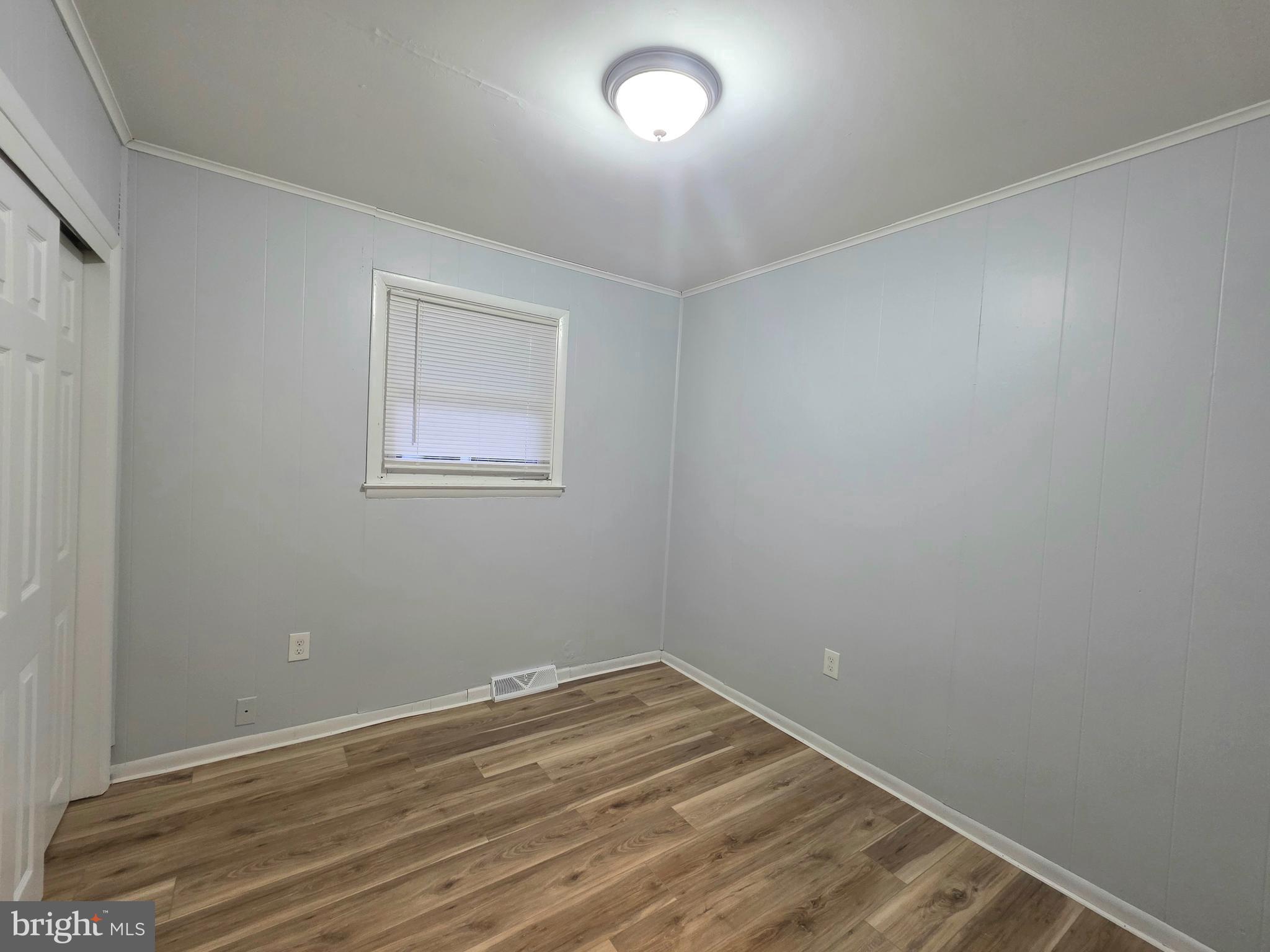 11 Fairview Avenue Bridgeton, NJ 08302 - Photo 28 of 33 wooden floor in an empty room