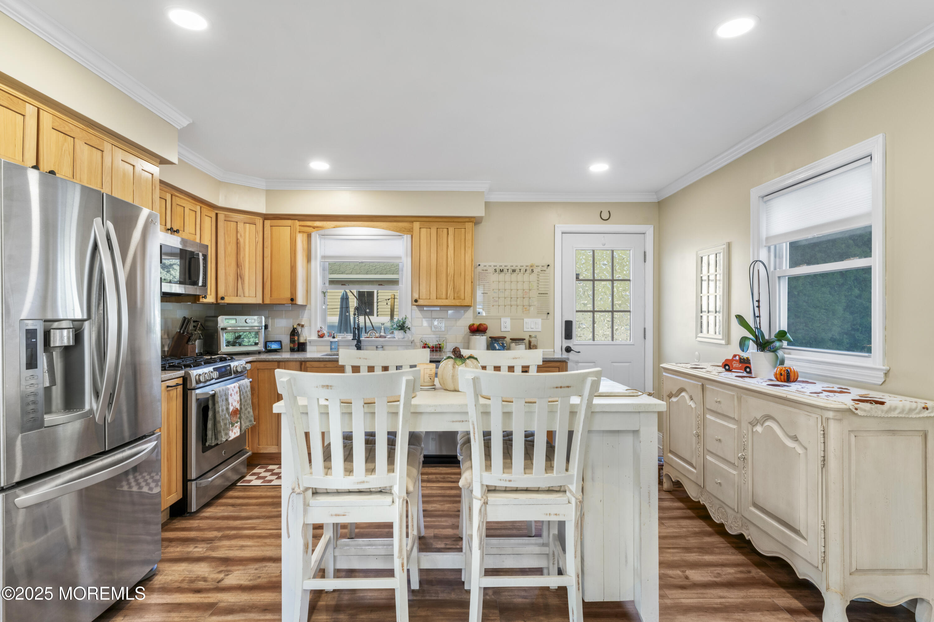 240 Timberline Road Toms River, NJ 08753 - Photo 13 of 25 a large kitchen with a table and chairs