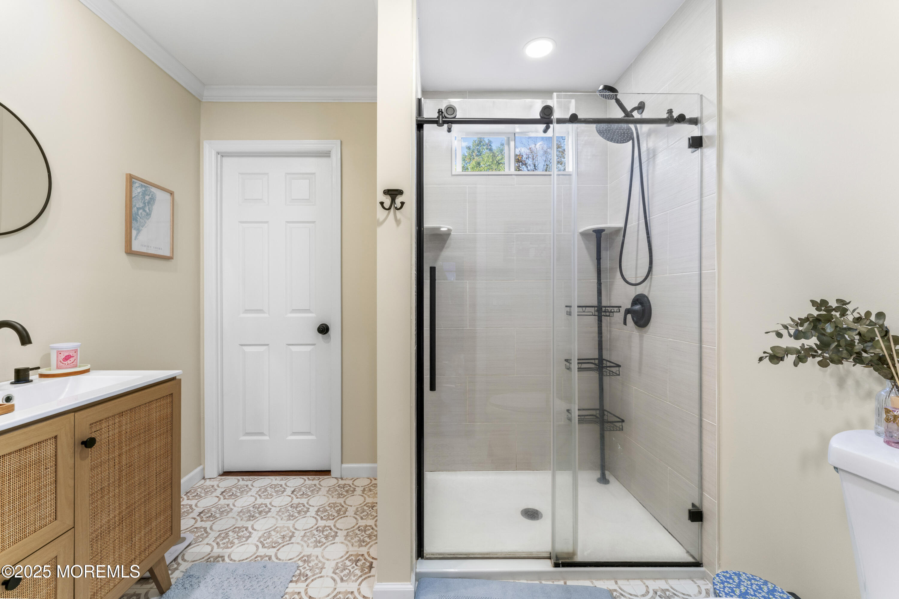 240 Timberline Road Toms River, NJ 08753 - Photo 19 of 25 a bathroom with a shower a mirror and a sink