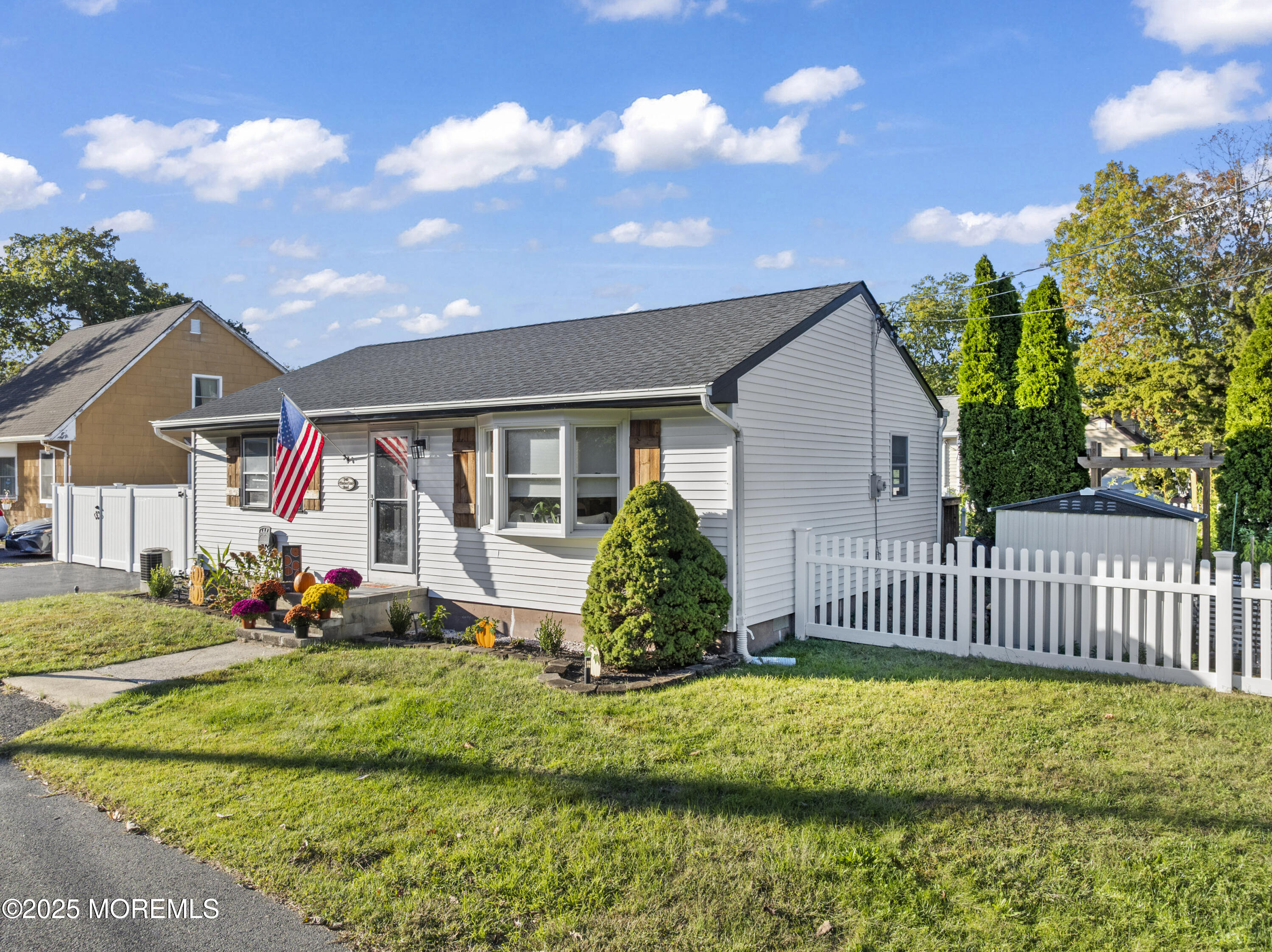 240 Timberline Road Toms River, NJ 08753 - Photo 2 of 25 a front view of a house with a garden