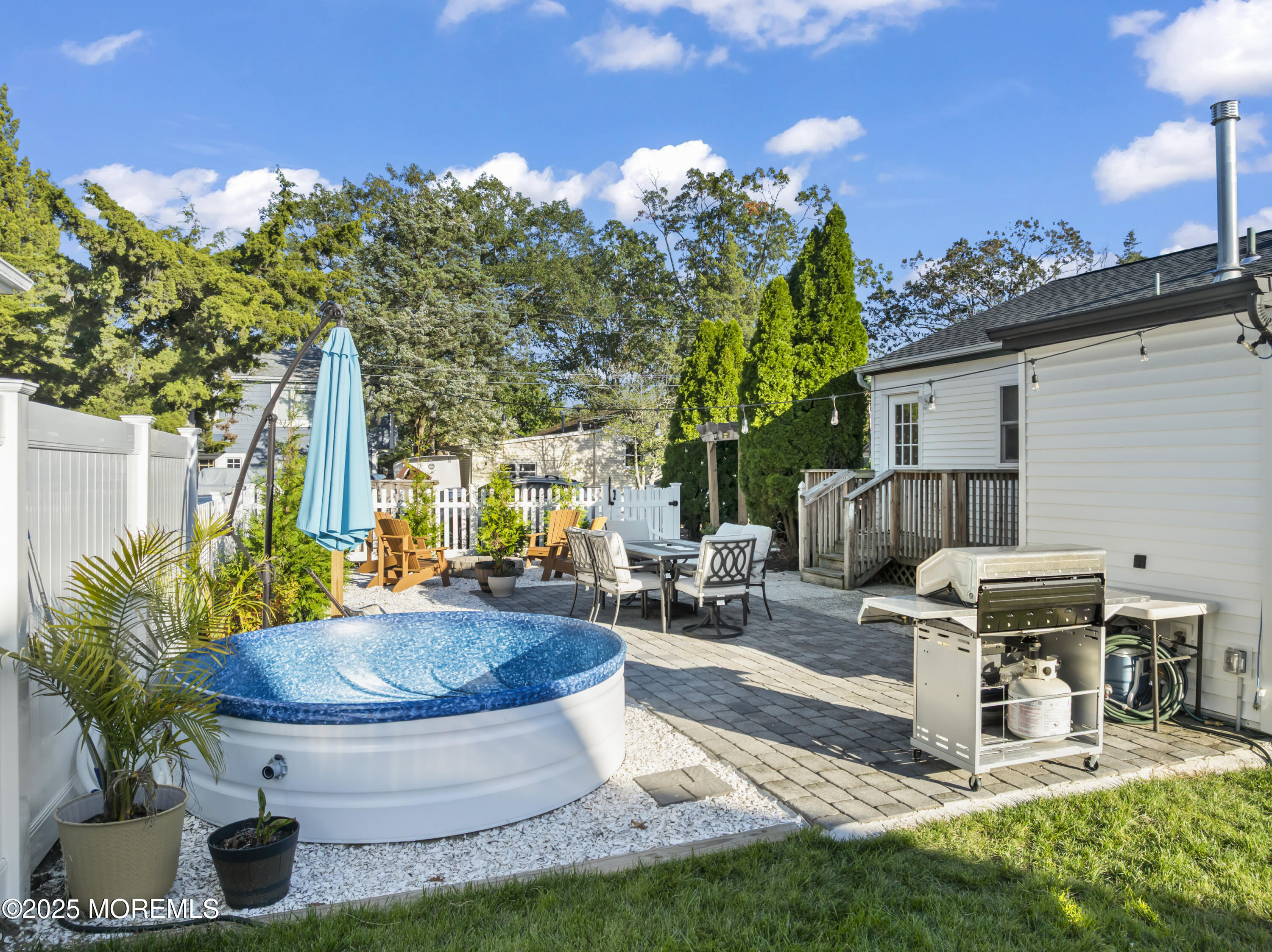 240 Timberline Road Toms River, NJ 08753 - Photo 6 of 25 a view of a backyard with plants and patio