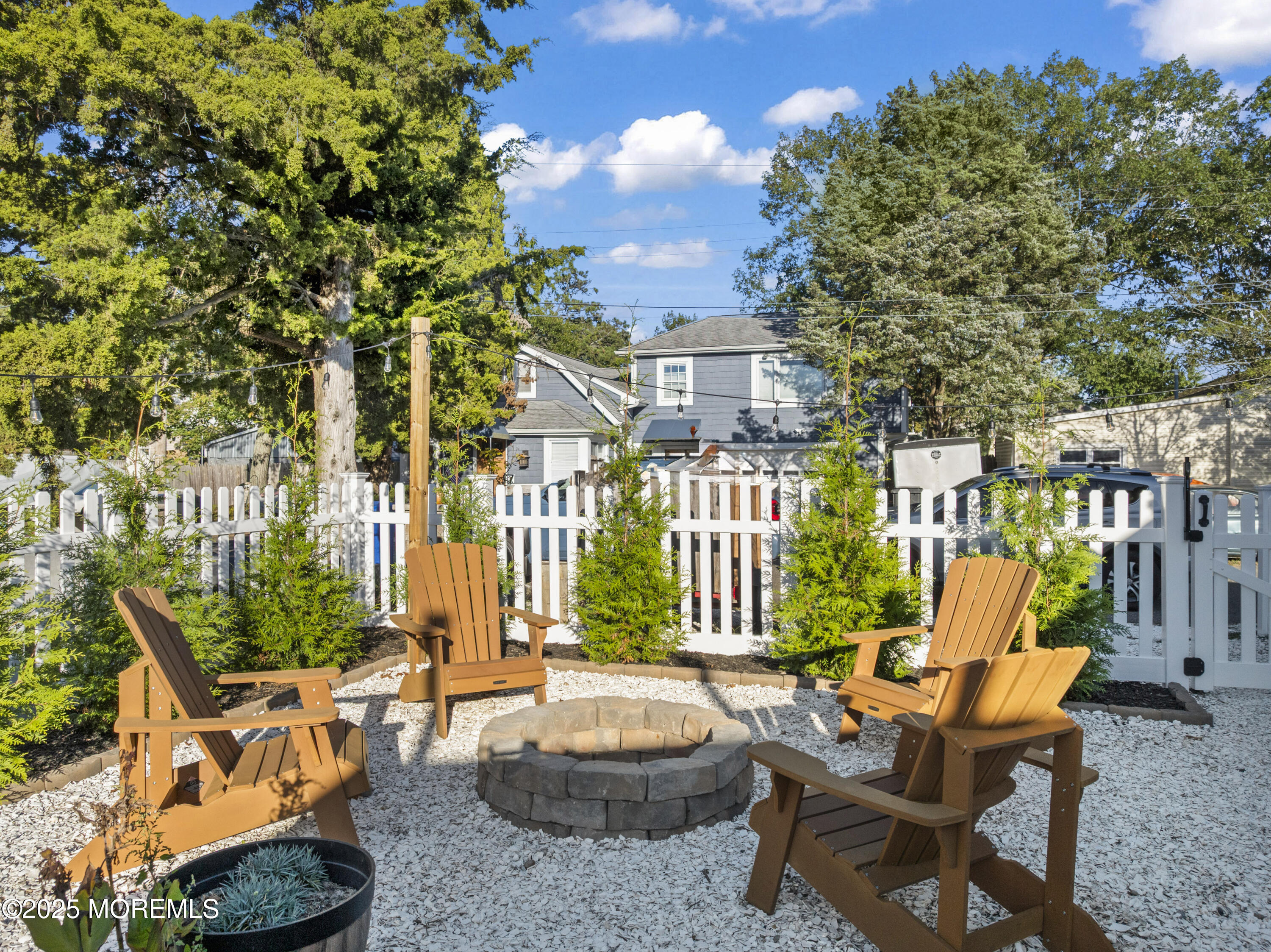 240 Timberline Road Toms River, NJ 08753 - Photo 8 of 25 a view of a patio with couches table and chairs and potted plants