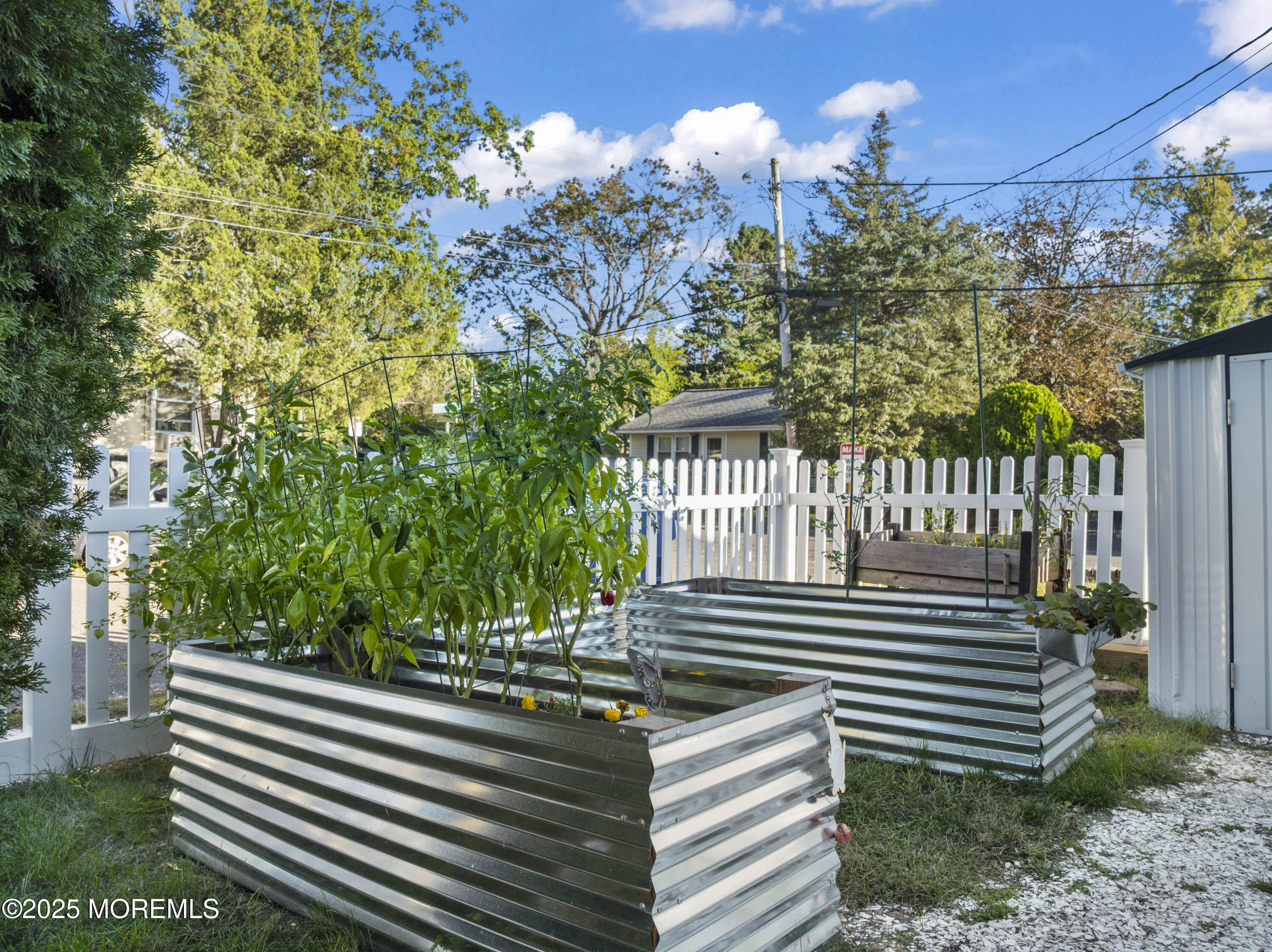 240 Timberline Road Toms River, NJ 08753 - Photo 10 of 25 a view of a bench in a garden