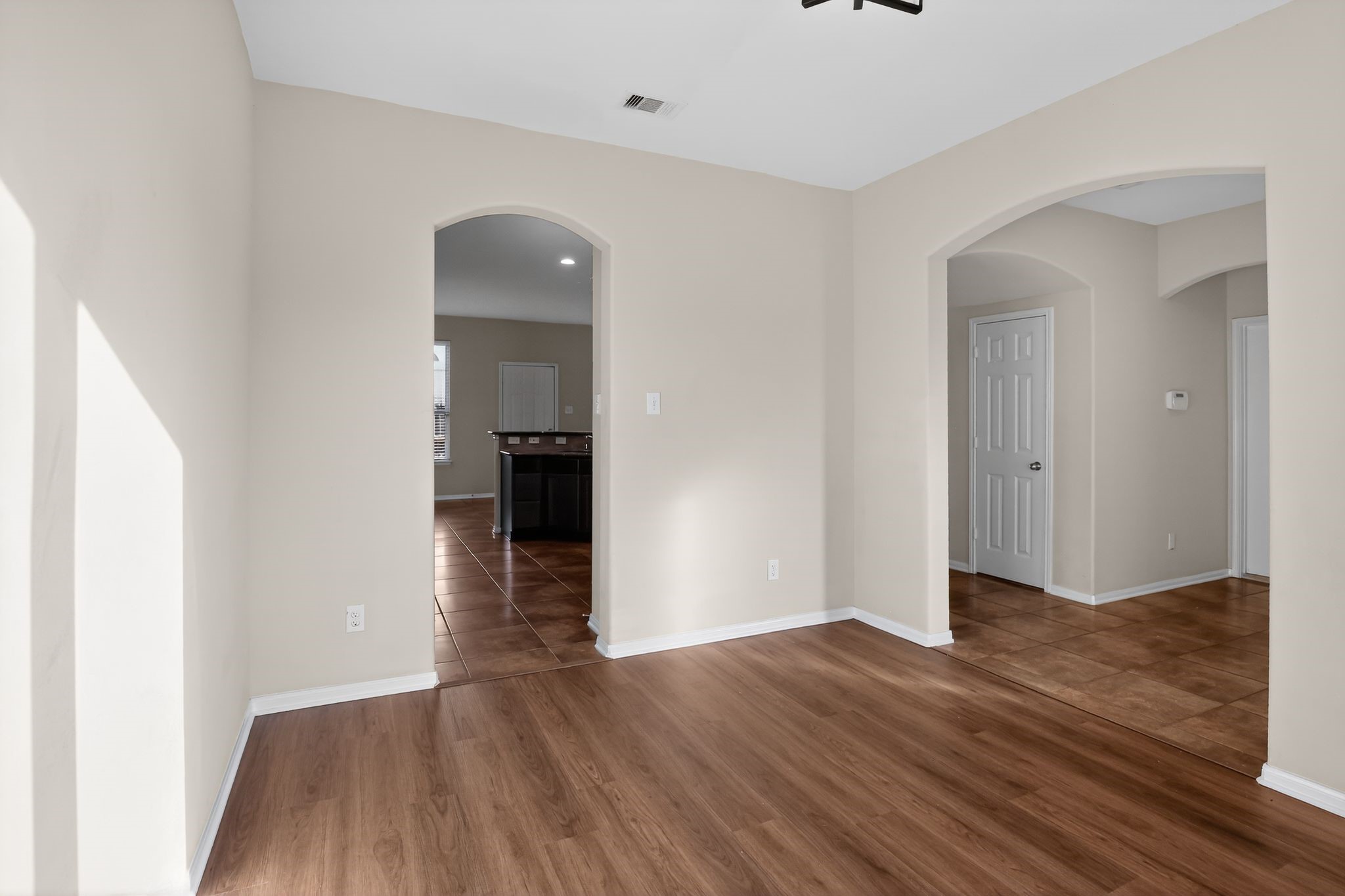 4938 Yearling Ridge Court Katy, TX 77449 - Photo 11 of 29 an empty room with wooden floor and closet