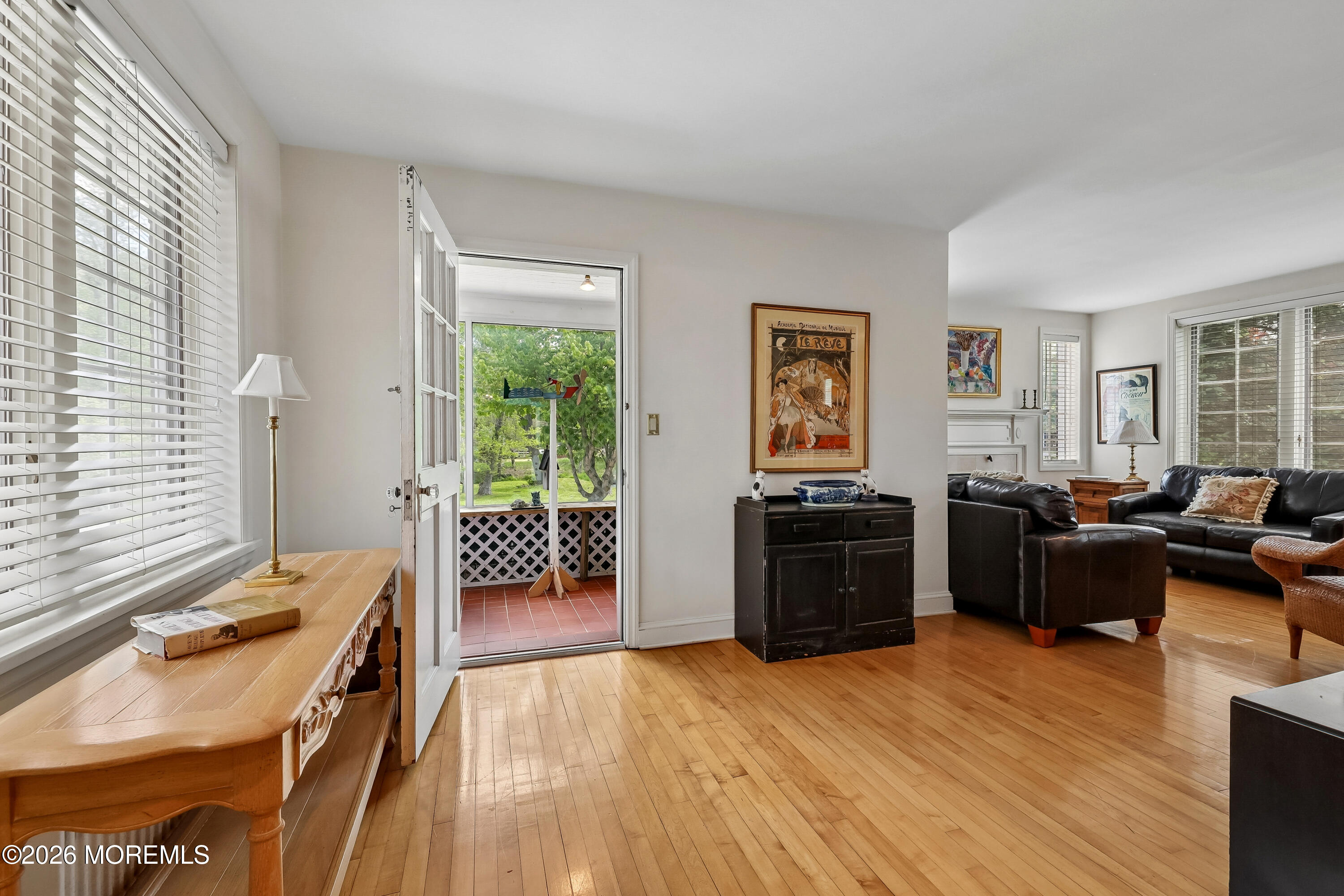 187 Hockhockson Road Colts Neck, NJ 07722 - Photo 24 of 55 a living room with furniture and a wooden floor