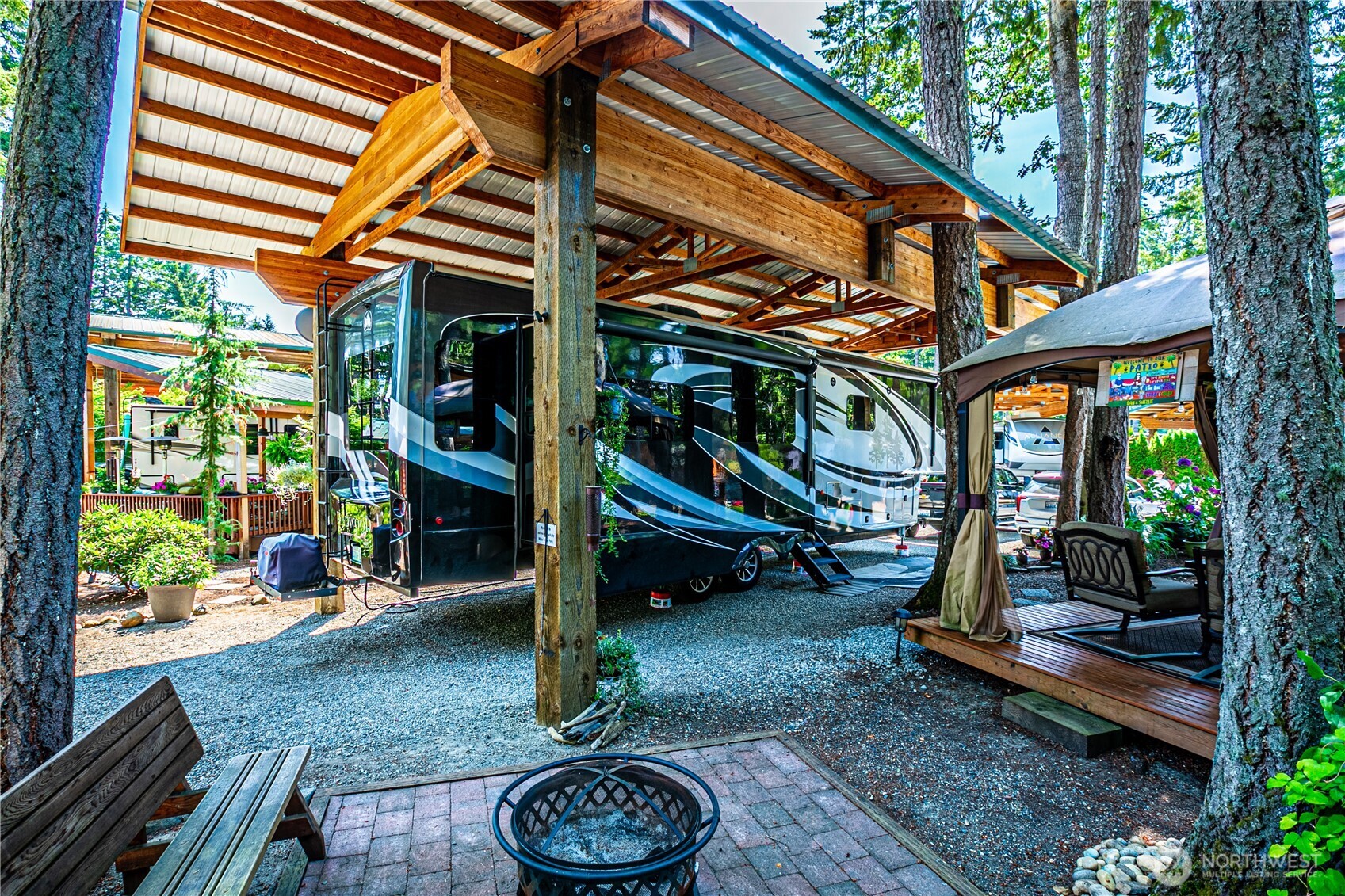 1546 Reservation Road Southeast, Unit 253 Olympia, WA 98513 - Photo 20 of 38 a view of a backyard with a patio