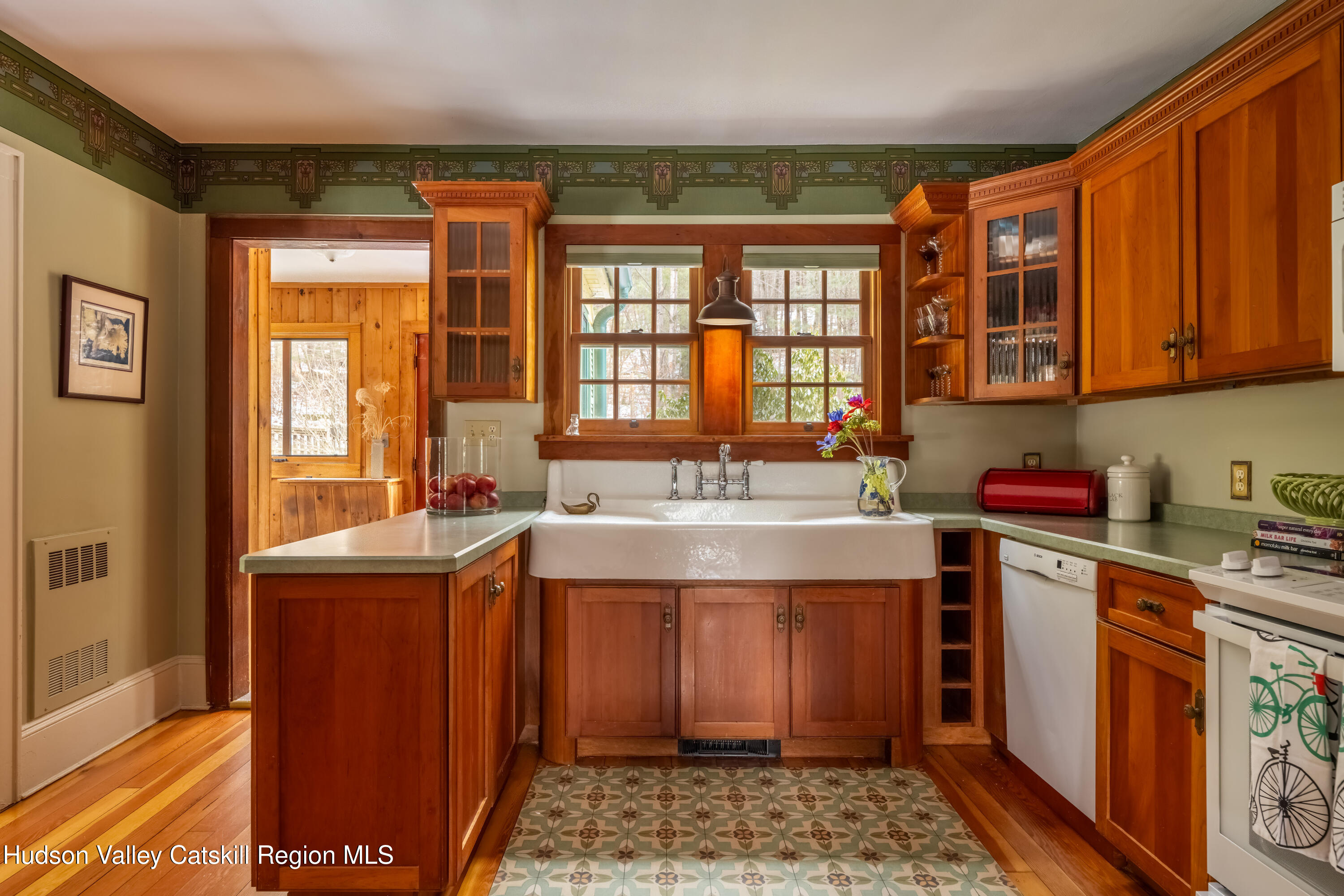 72 High Point Mountain Road West Shokan, NY 12494 - Photo 14 of 33 a view of a kitchen with stainless steel appliances granite countertop a stove a sink and dishwasher with wooden cabinets